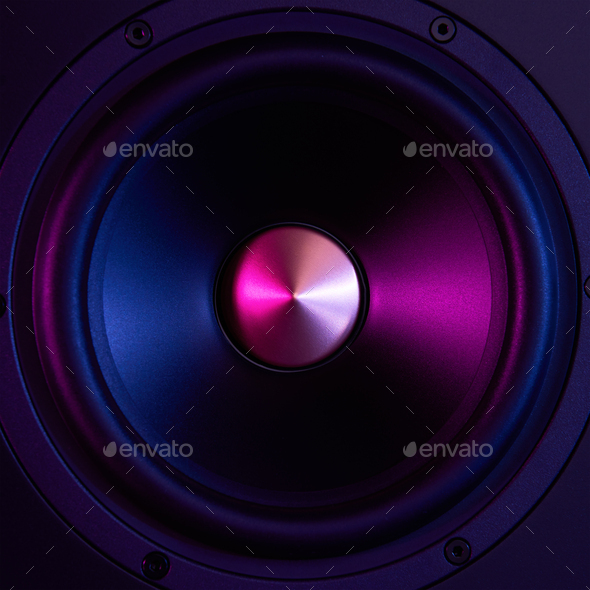 Sound speaker on dark background with neon lights