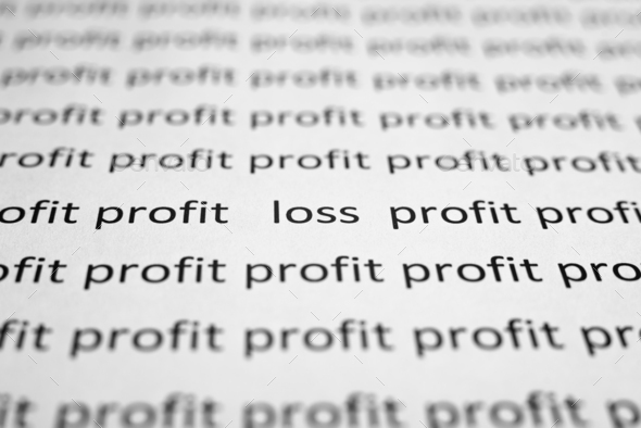 Financial problems, economic crisis concept. Printed text profit and loss on white paper close-up