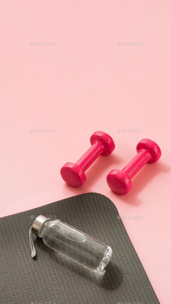 Fitness concept. Sport mat, dumpbells Stock Photo by Fasci