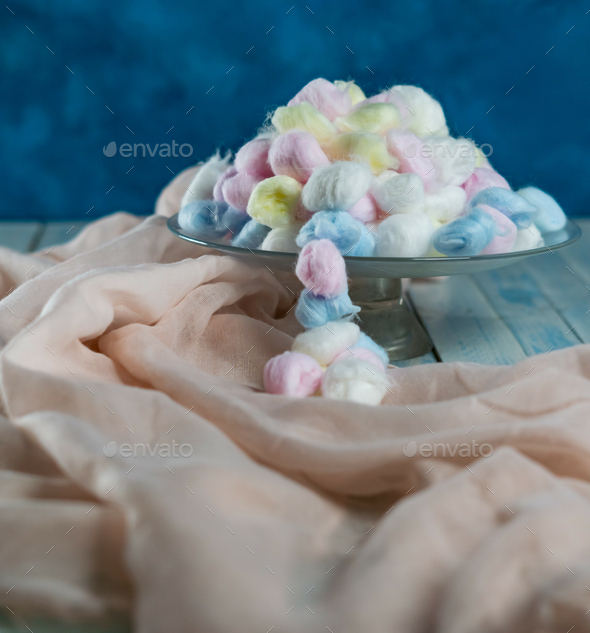 colored cotton balls Stock Photo by wirestock
