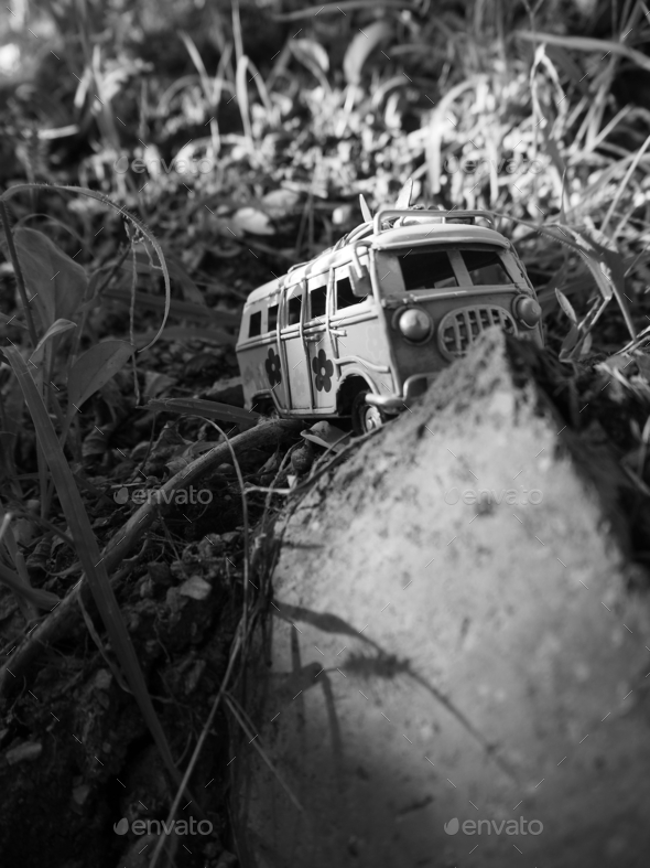 Grayscale of toy minibus by stone Stock Photo by wirestock | PhotoDune