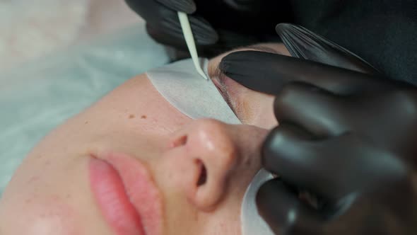 Closeup of a Woman's Face on Which Eyelash Extensions are Done alt