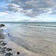 Sea coast with seashells and texture waves, sea lanscape. - PhotoDune Item for Sale