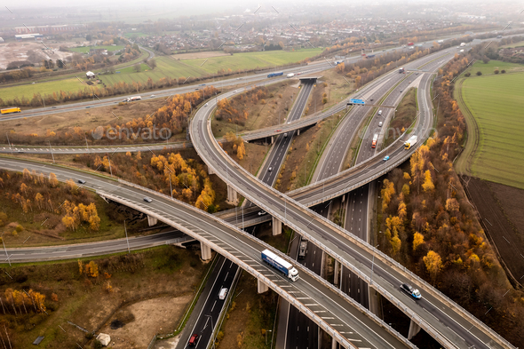 Aerial view of a complex motorway road layout in the UK countryside ...