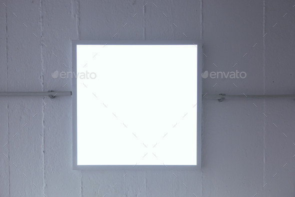 LED ceiling light mounted in an industrial room