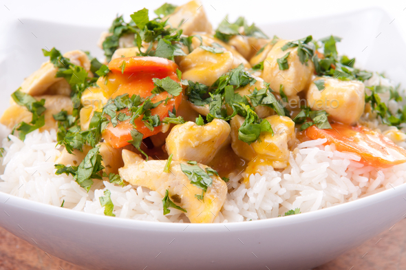 Thai coconut and mango curry with diced chicken and sliced carro