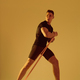 Athletic man with fit muscular body training in studio - PhotoDune Item for Sale