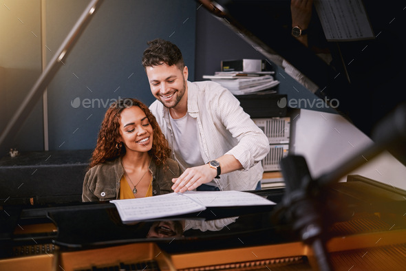 Musicians, piano and people writing music in a creative or recording studio with a song book. Art,