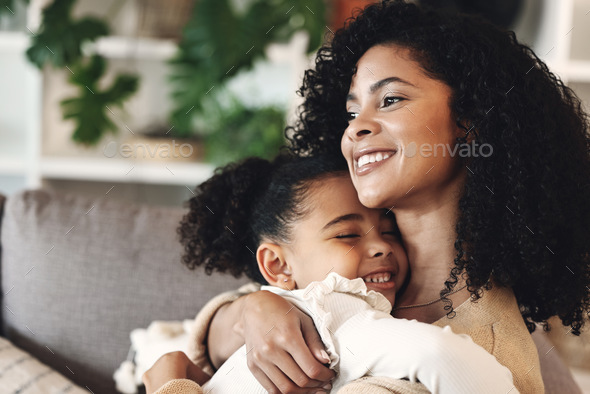 Black family, love and hug by girl and mother on a sofa, happy and ...