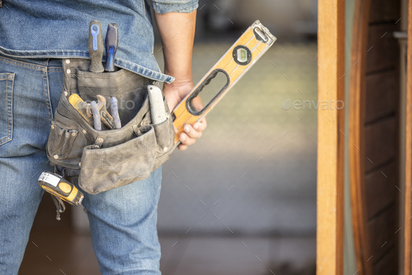 Maintenance man, bag and tools with space, mockup and home improvement service for property industr