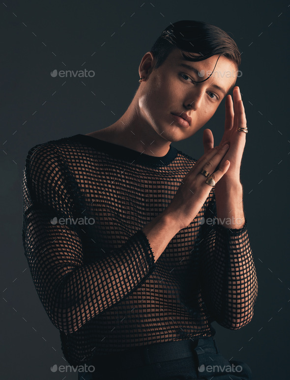 Gender neutral, face and fashion, portrait on dark background and trendy, edgy with hands. Creative