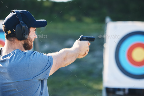 Man, firearm training and target for outdoor challenge, goals and aim for police, army or security