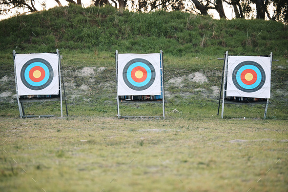 Bullseye target board, outdoor and field at shooting range for weapon training, aim and accuracy. S
