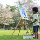 Cute little boy painting at the park  - PhotoDune Item for Sale