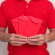 man holding Chinese red envelope - PhotoDune Item for Sale