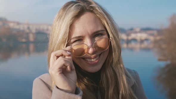 Closeup Portrait of a Happy Young Woman Smiling at the Camera alt