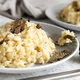 Risotto with porcini mushrooms and black truffles served in a plate top view, gourmet cousine - PhotoDune Item for Sale