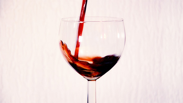 Red Wine Poured Into Glass