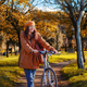 Girl with bicycle at the park - PhotoDune Item for Sale