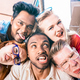 Multiracial millenial friends taking selfie sticking out tongue with funny faces - PhotoDune Item for Sale