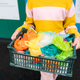 Zero waste, recycling, environmental issues Close up of girl holding box with different plastic bags - PhotoDune Item for Sale