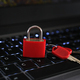 Cyber Security Concept - red padlock lock on laptop computer keyboard - PhotoDune Item for Sale