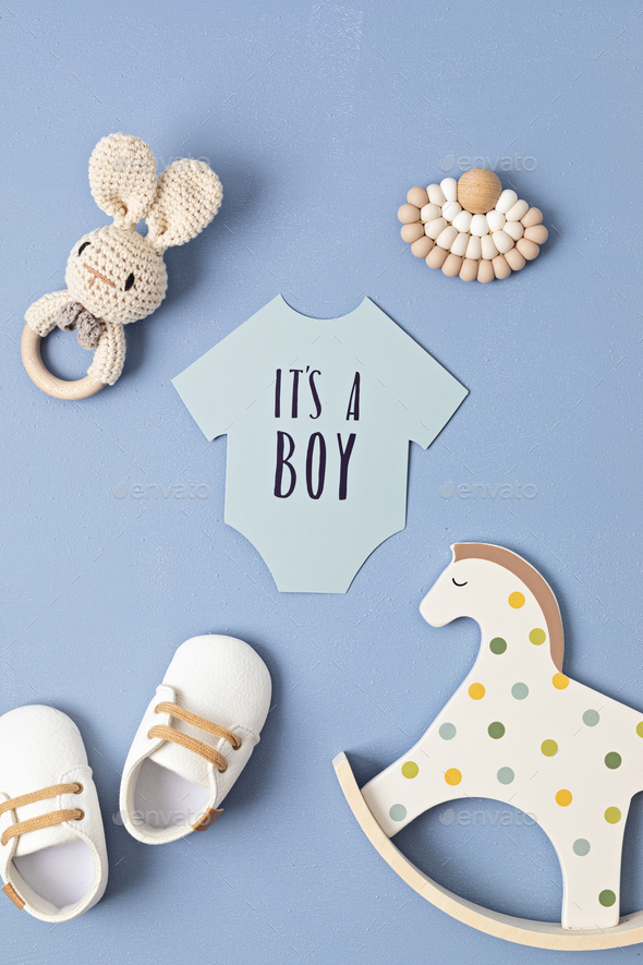 Baby shower, gender reveal party. It\'s a boy message over paper cut