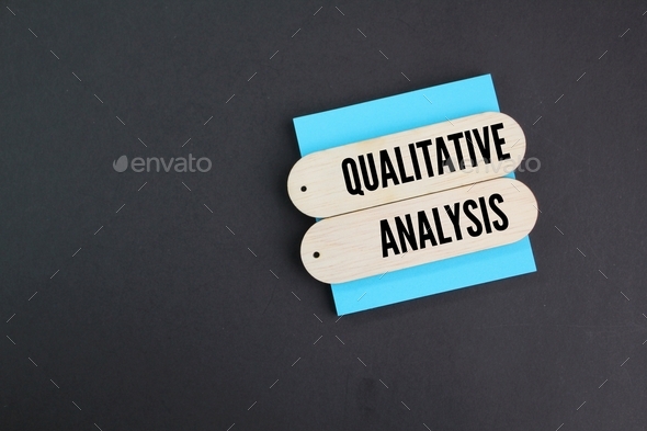 wooden board with the word QUALITATIVE ANALYSIS - Stock Photo - Images