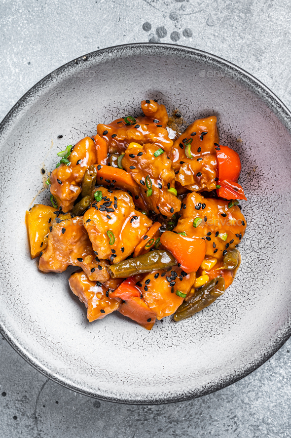 Chinese Sweet And Sour Pork Guo Bao Rou In A Bowl Gray Background Top