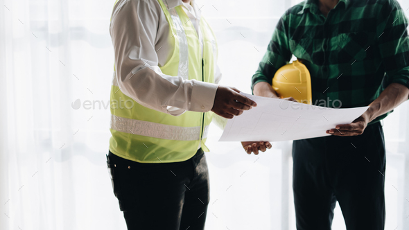 Engineer meeting for architectural project. working with partner and engineering tools on workplace. - Stock Photo - Images