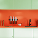 Colorful orange and green kitchen, countertop with sink and kitchen utensils, 3d rendering - PhotoDune Item for Sale