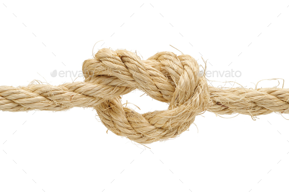 Overhand knot made of rough hemp rope - Stock Photo - Images