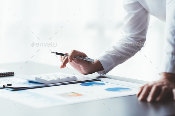 Businessman Accounting Calculating Cost Economic Financial data.