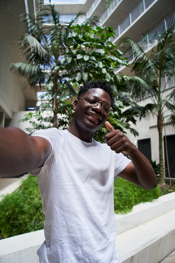 Vertical Pov Selfie Of A Smiling And Cheerful Young African American