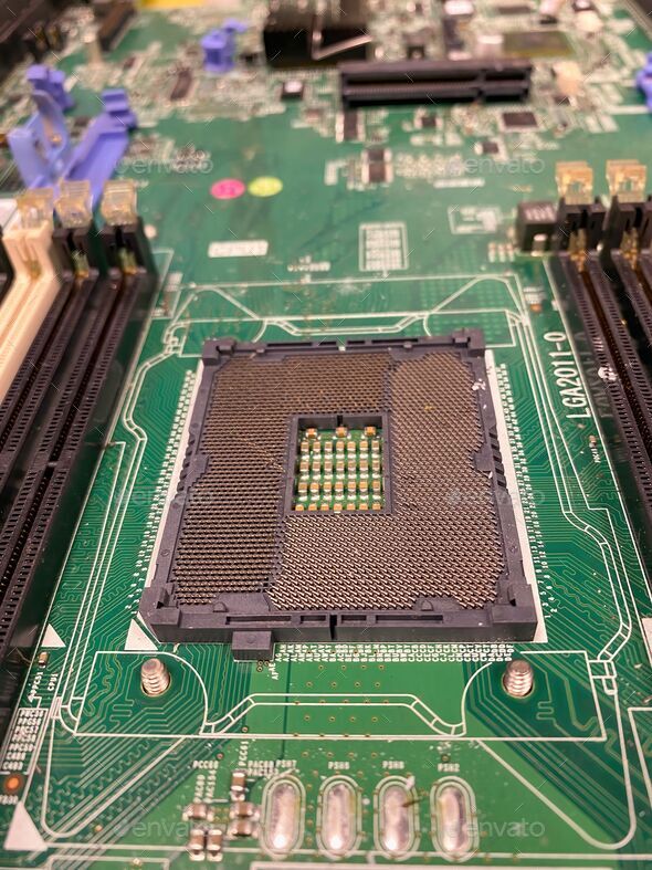 Computer motherboard being dismantled for recycling Stock Photo by