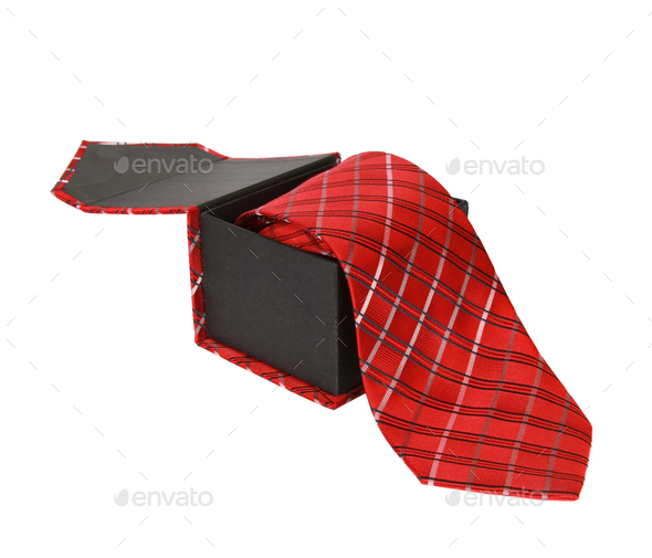 Red flannel tie inside a box on a white background