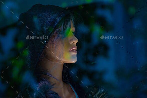 Woman Mannequin Face Profile in a dark Background Stock Photo by wirestock