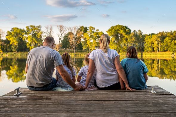 Kids Sitting On Dock Photos, Images and Pictures