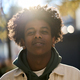 Cool young gen z hipster African American teen in sunny city park. Portrait - PhotoDune Item for Sale