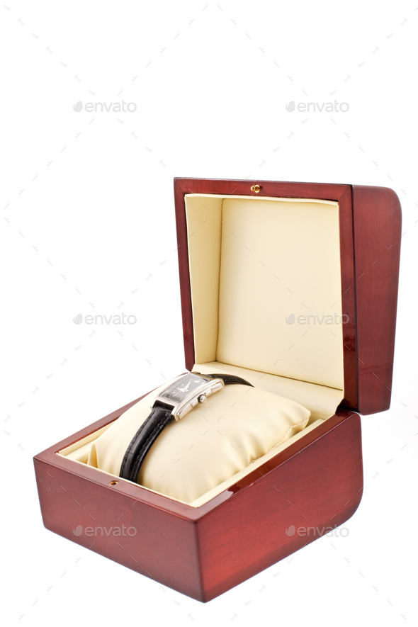 female silver watch in a wood gift box - Stock Photo - Images