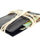 tied black leather wallet with euro notes - PhotoDune Item for Sale