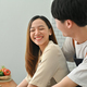 Affectionate asian man and smiling woman preparing homemade pastry, spending time. - PhotoDune Item for Sale
