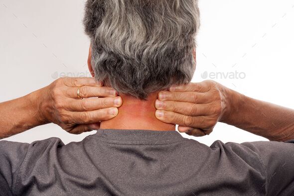 Mature Man stretching back of neck for pain relief