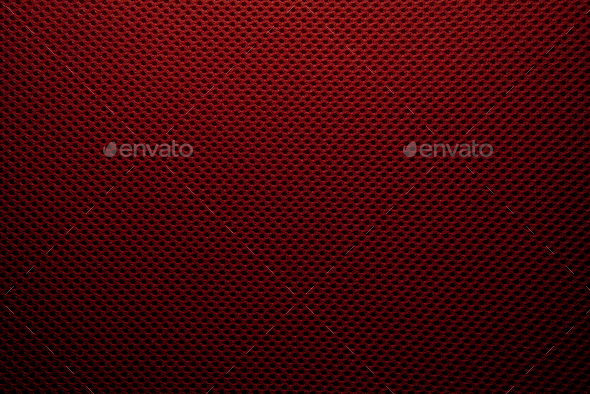 Background or wallpaper with abstract red carbon fiber texturered paper textures - copy space