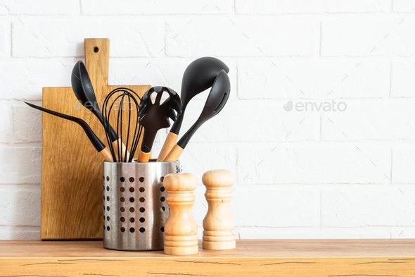 Professional cooking tools set for a modern kitchen in a brown wooden  stylish box Stock Photo - Alamy