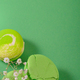 Close up of macarons cakes on green background - PhotoDune Item for Sale