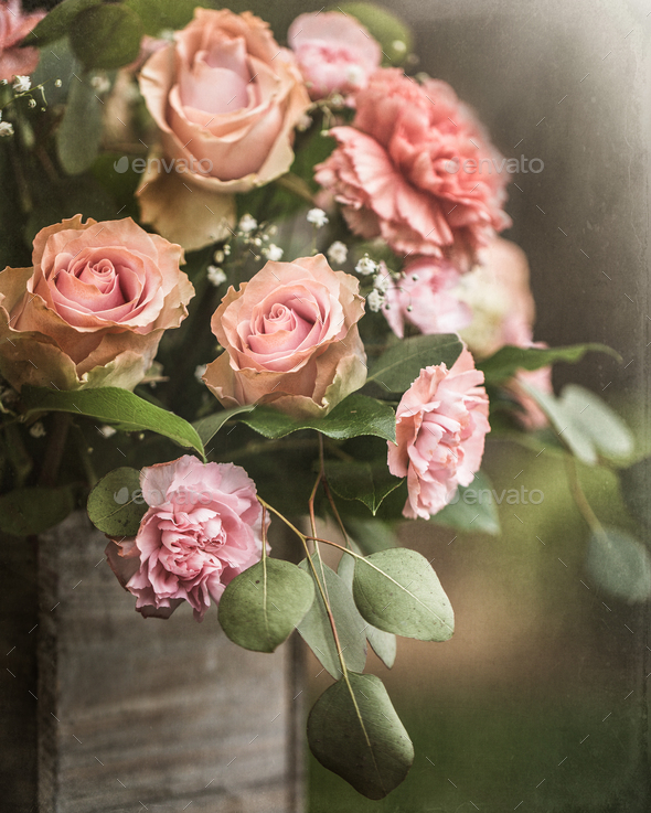 Fine Art Still Life Image of a beautiful Bouquet of pink carnations and roses. - Stock Photo - Images