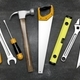 Various hand tools set on  blackboard surface - PhotoDune Item for Sale