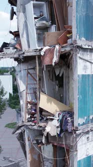 Vertical Video of a Destroyed Residential Building in Ukraine During the War alt