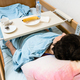 woman and table with dishes on hospital bed - PhotoDune Item for Sale